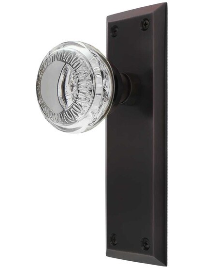 New York Door Set with Ovolo Crystal-Glass Knobs in Timeless Bronze.